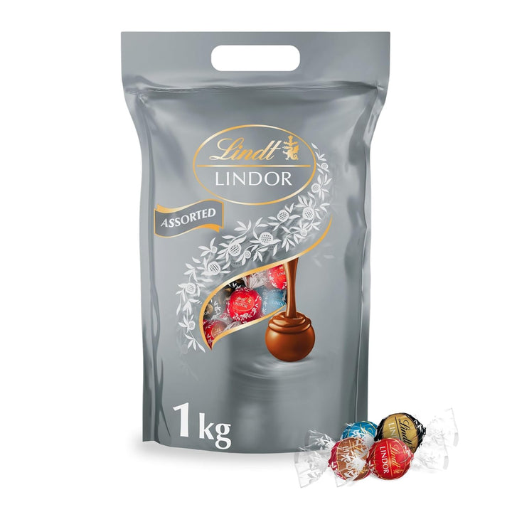 Lindt LINDOR Silber Mischung | 1 Kg Beutel| 78 Schokoladen Kugeln |Milch, 70%, Salted Caramel, Double Chocolate Mit Zartschmelzender Füllung | Großpackung | Pralinen Geschenk | Schokoladengeschenk